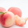 fresh japan white peaches on white background